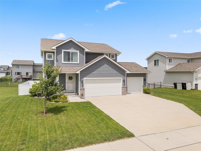 2718 NW 23rd St, Ankeny, IA 50023 - view of front of house featuring a garage, driveway, and roof with shingles