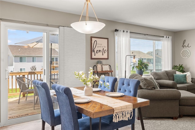2718 NW 23rd St, Ankeny, IA 50023 - dining space featuring light wood-style flooring