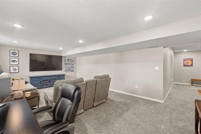 2718 NW 23rd St, Ankeny, IA 50023 - carpeted living area featuring recessed lighting and a textured ceiling