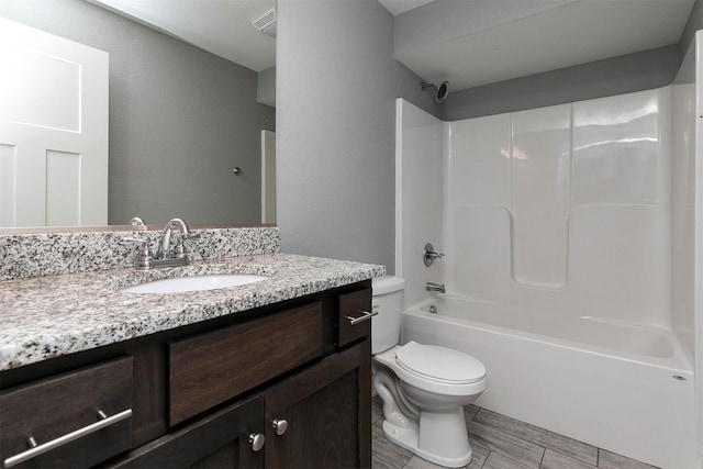 2017 NE Heritage Dr, Grimes, IA 50111 - full bathroom with vanity, shower / tub combination, and wood finished floors