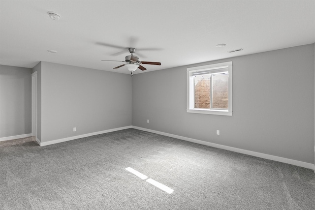 2017 NE Heritage Dr, Grimes, IA 50111 - spare room with a ceiling fan, carpet flooring, and a smoke detector