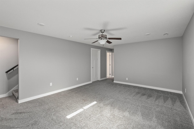 2017 NE Heritage Dr, Grimes, IA 50111 - unfurnished room with a ceiling fan, carpet, and stairs