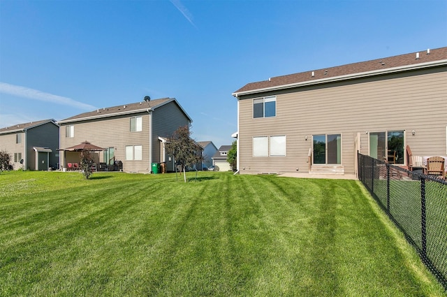 2017 NE Heritage Dr, Grimes, IA 50111 - rear view of property with a gazebo and a patio area