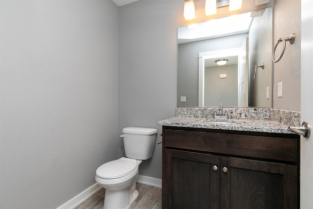 2017 NE Heritage Dr, Grimes, IA 50111 - bathroom with wood finished floors and vanity