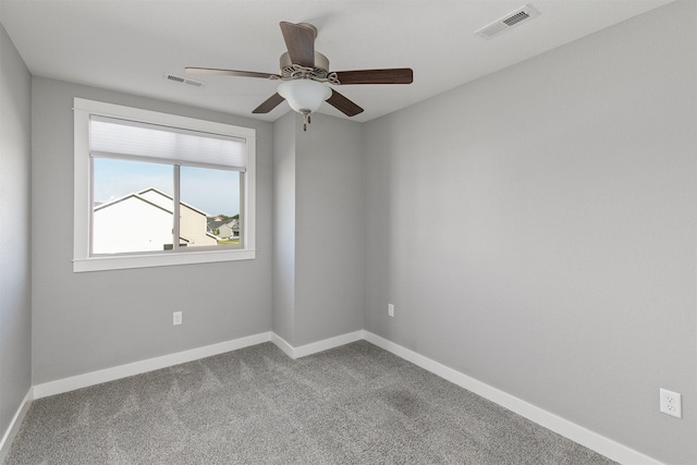 2017 NE Heritage Dr, Grimes, IA 50111 - empty room featuring a ceiling fan and carpet floors
