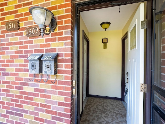 1509 Del Matro Ct, Windsor Heights, IA 50324 - view of exterior entry with brick siding