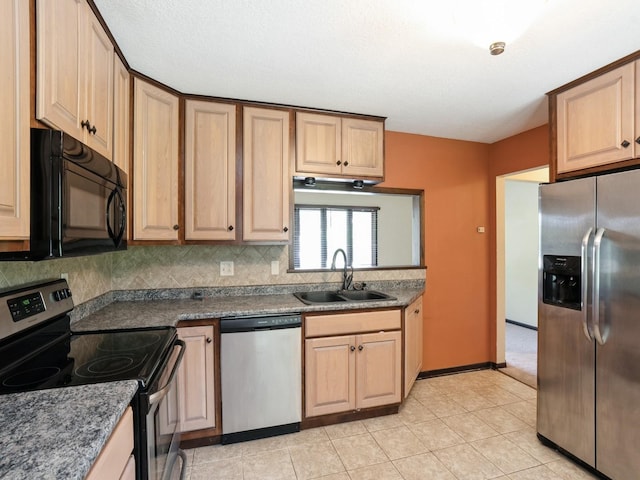 1509 Del Matro Ct, Windsor Heights, IA 50324 - kitchen featuring stainless steel appliances, decorative backsplash, dark countertops, and light tile patterned flooring