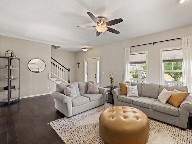 145 SE Kellerman Ln, Waukee, IA 50263 - living room featuring stairway, a ceiling fan, and dark wood finished floors