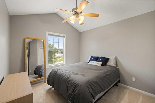 145 SE Kellerman Ln, Waukee, IA 50263 - carpeted bedroom with lofted ceiling and a ceiling fan