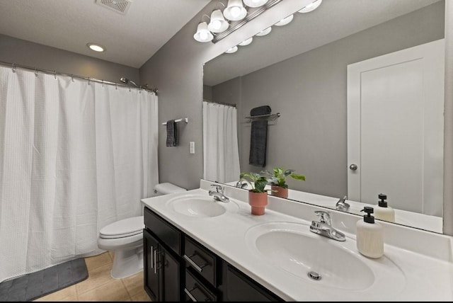 145 SE Kellerman Ln, Waukee, IA 50263 - bathroom featuring double vanity and curtained shower