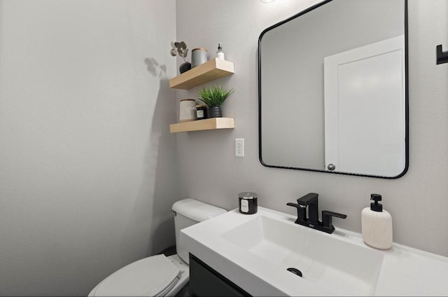145 SE Kellerman Ln, Waukee, IA 50263 - bathroom featuring vanity and toilet