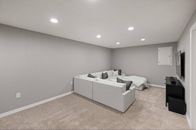 145 SE Kellerman Ln, Waukee, IA 50263 - living room featuring light carpet and recessed lighting
