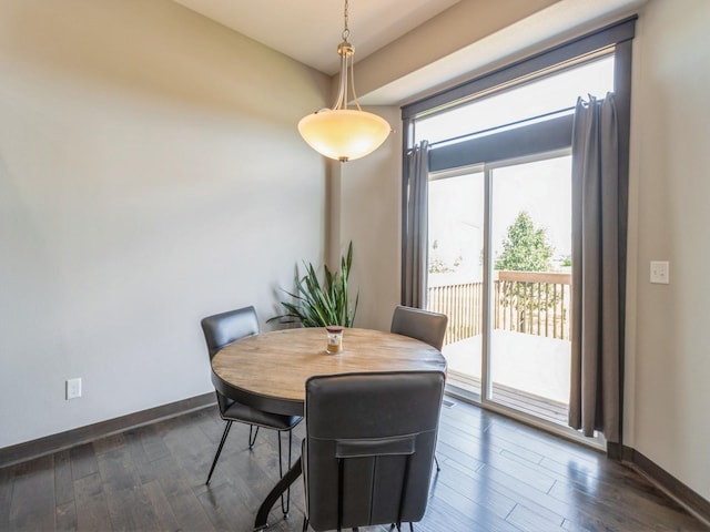 8955 Jamison Dr, West Des Moines, IA 50266 - dining area with dark wood-style floors