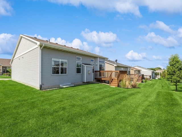 8955 Jamison Dr, West Des Moines, IA 50266 - back of house with a wooden deck and a yard