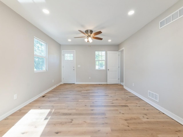 404 S B St, Indianola, IA 50125 - unfurnished room with ceiling fan, recessed lighting, and light wood-style floors