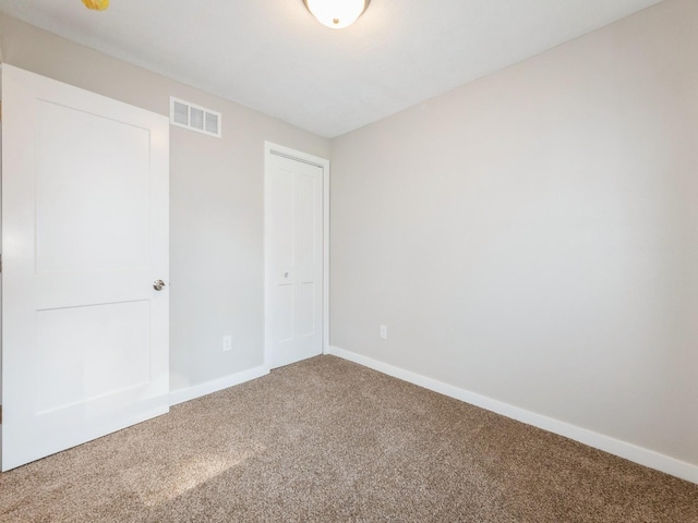 404 S B St, Indianola, IA 50125 - unfurnished bedroom with carpet flooring and a closet