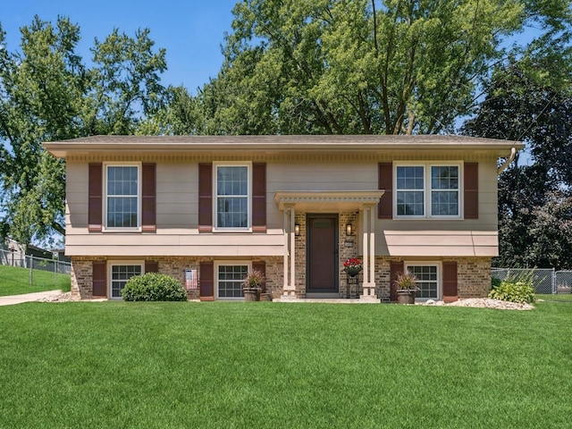 4408 66th St, Urbandale, IA 50322 - split foyer home featuring brick siding