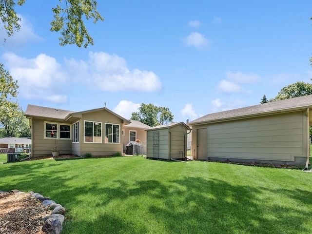 4408 66th St, Urbandale, IA 50322 - back of property featuring a storage unit