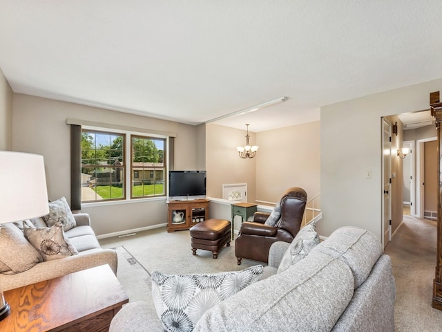4408 66th St, Urbandale, IA 50322 - living room featuring carpet floors and a chandelier