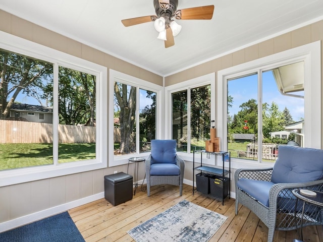 4408 66th St, Urbandale, IA 50322 - sunroom / solarium featuring a ceiling fan, hardwood / wood-style floors, and plenty of natural light