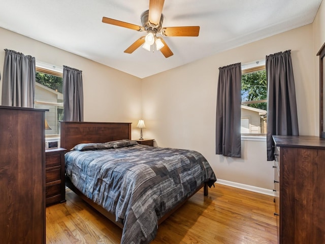 4408 66th St, Urbandale, IA 50322 - bedroom with wood finished floors and ceiling fan