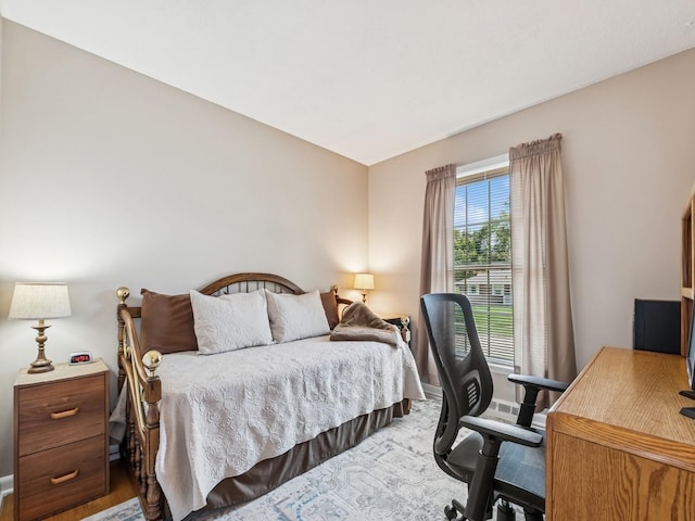 4408 66th St, Urbandale, IA 50322 - bedroom with a desk and wood finished floors
