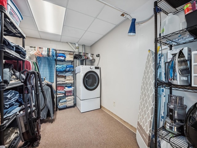 4408 66th St, Urbandale, IA 50322 - washroom featuring carpet and washer / dryer