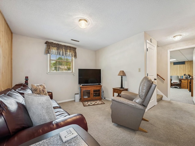 4408 66th St, Urbandale, IA 50322 - carpeted living area with a textured ceiling and stairs
