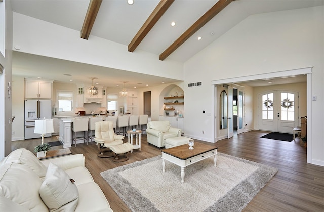 11174 NW 108th Ct, Granger, IA 50109 - living room with recessed lighting, high vaulted ceiling, french doors, beamed ceiling, and dark wood finished floors