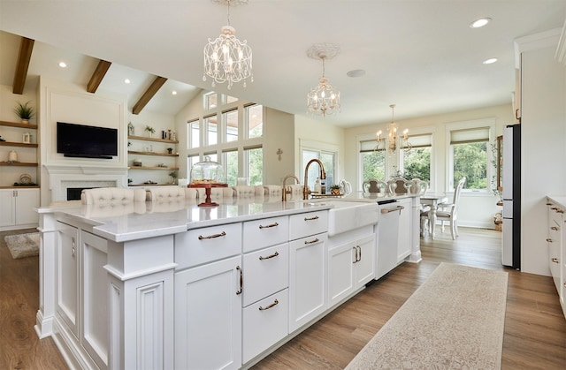 11174 NW 108th Ct, Granger, IA 50109 - kitchen with a chandelier, dishwasher, white cabinets, wood finished floors, and recessed lighting