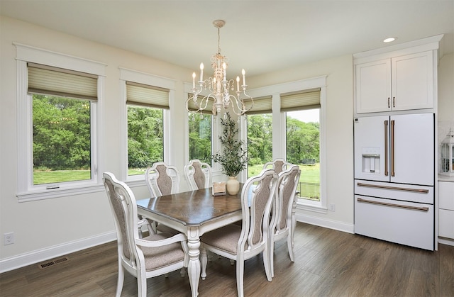 11174 NW 108th Ct, Granger, IA 50109 - dining room featuring a chandelier, plenty of natural light, dark wood-style floors, and recessed lighting