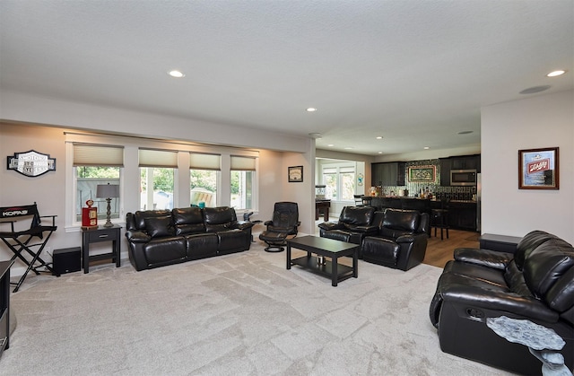 11174 NW 108th Ct, Granger, IA 50109 - living room with recessed lighting and carpet flooring