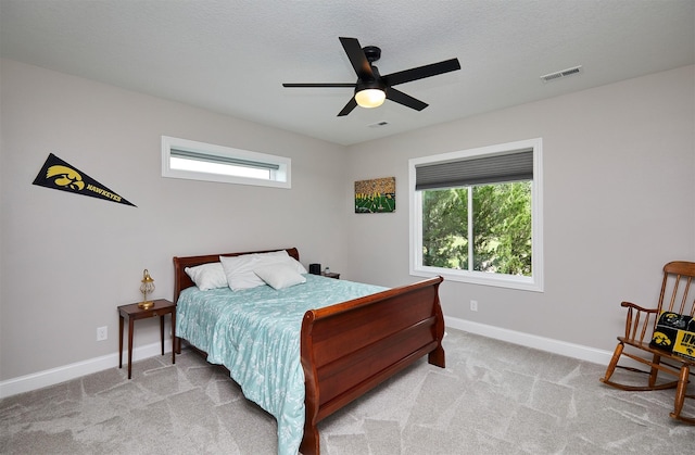11174 NW 108th Ct, Granger, IA 50109 - bedroom with light carpet and ceiling fan