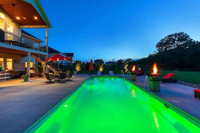 11174 NW 108th Ct, Granger, IA 50109 - outdoor pool featuring a fire pit, a patio, and stairway