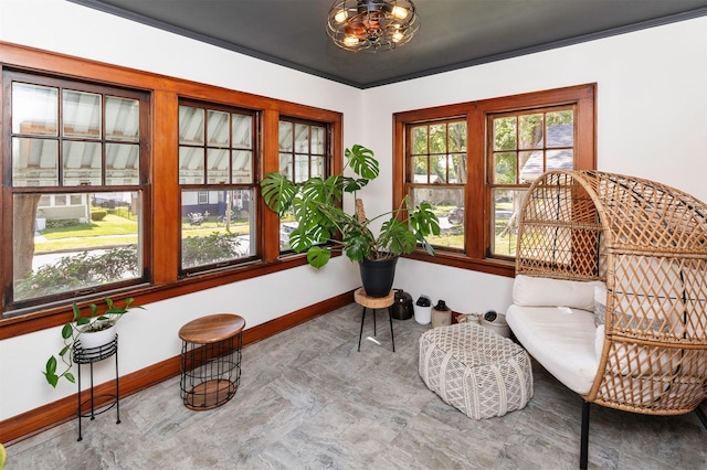 2220 York St, Des Moines, IA 50316 - living area with baseboards and a chandelier