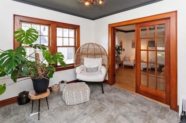 2220 York St, Des Moines, IA 50316 - sitting room with a chandelier and ornamental molding