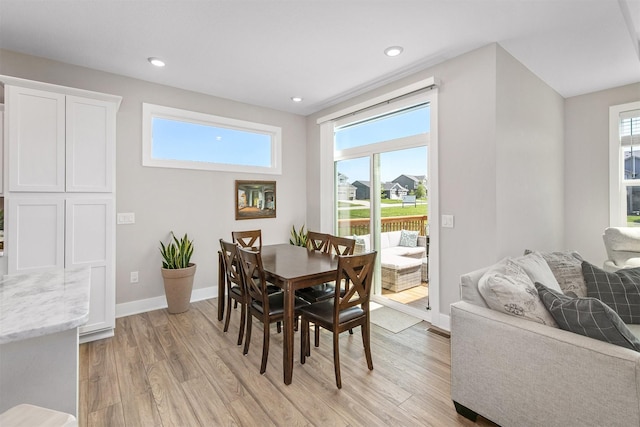 2845 SE Bluestem Dr, Waukee, IA 50263 - dining area with light wood-type flooring and recessed lighting