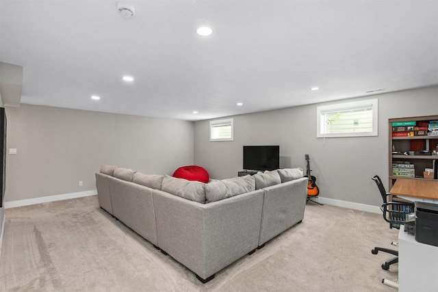2845 SE Bluestem Dr, Waukee, IA 50263 - living room with recessed lighting, light colored carpet, and a desk