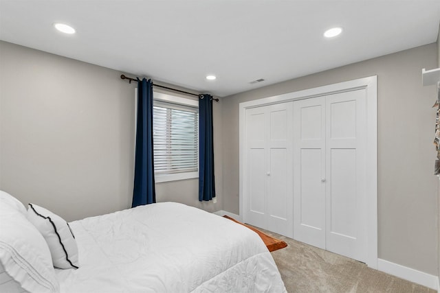 2845 SE Bluestem Dr, Waukee, IA 50263 - bedroom featuring recessed lighting, carpet, and a closet