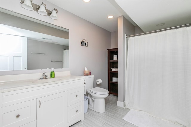 2845 SE Bluestem Dr, Waukee, IA 50263 - bathroom with vanity, a shower with shower curtain, and recessed lighting