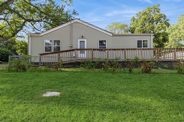 3901 Lawnwoods Dr, Des Moines, IA 50310 - rear view of property with a wooden deck and a lawn