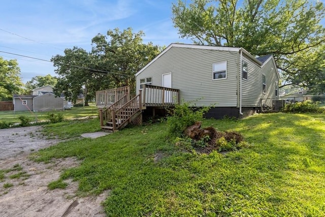 3901 Lawnwoods Dr, Des Moines, IA 50310 - rear view of property with a wooden deck and stairway
