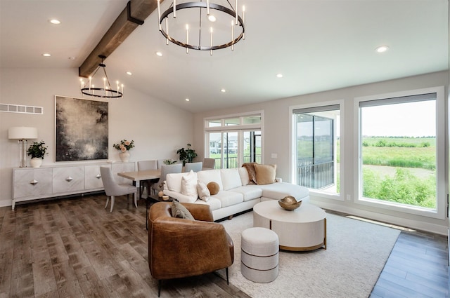 16320 Northpark Dr, Urbandale, IA 50323 - living room featuring a chandelier, wood finished floors, and recessed lighting