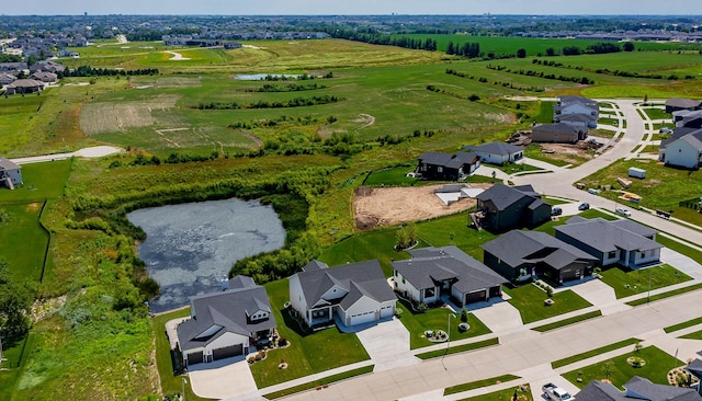 16320 Northpark Dr, Urbandale, IA 50323 - aerial view of residential area with a large body of water