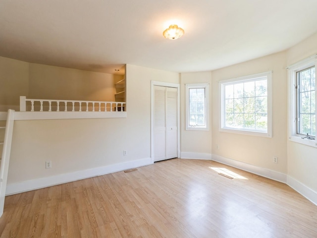 780 Iowa Ave, Martensdale, IA 50160 - spare room featuring wood finished floors and baseboards