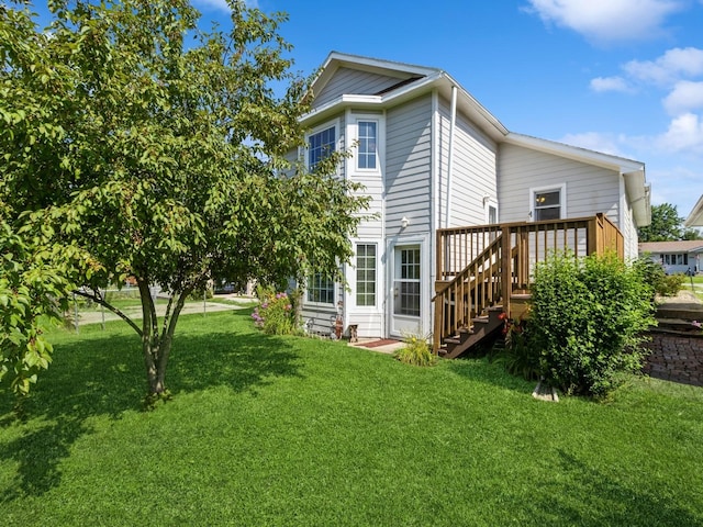 780 Iowa Ave, Martensdale, IA 50160 - view of side of home featuring stairs, a yard, and a deck