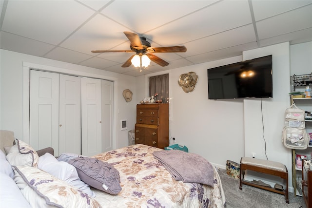 729 SE 3rd St, Ankeny, IA 50021 - bedroom featuring a closet, a drop ceiling, carpet, and ceiling fan