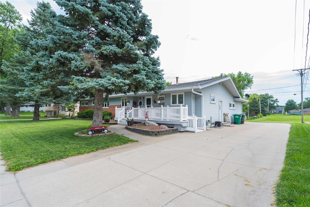 729 SE 3rd St, Ankeny, IA 50021 - ranch-style home featuring concrete driveway, a front yard, and covered porch