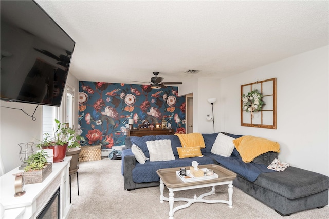 729 SE 3rd St, Ankeny, IA 50021 - carpeted living area featuring a ceiling fan and a baseboard radiator