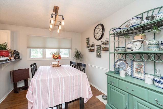 729 SE 3rd St, Ankeny, IA 50021 - dining room featuring dark wood-style floors and baseboards
